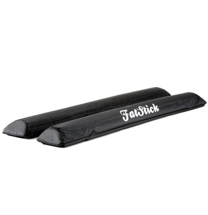 Angled view displaying two black FatStick Long Aero Roof Rack Bar Pads 71cm with white logo