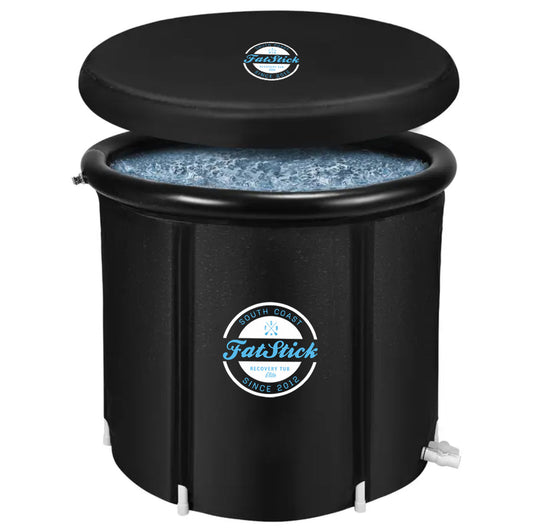 Round FatStick Recovery Ice Bath with lid slightly ajar, filled with ice and water, on a white background.