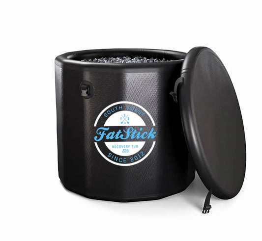 Black FatStick pro cold water therapy plunge tub, angled view with lid slightly open, full of ice.