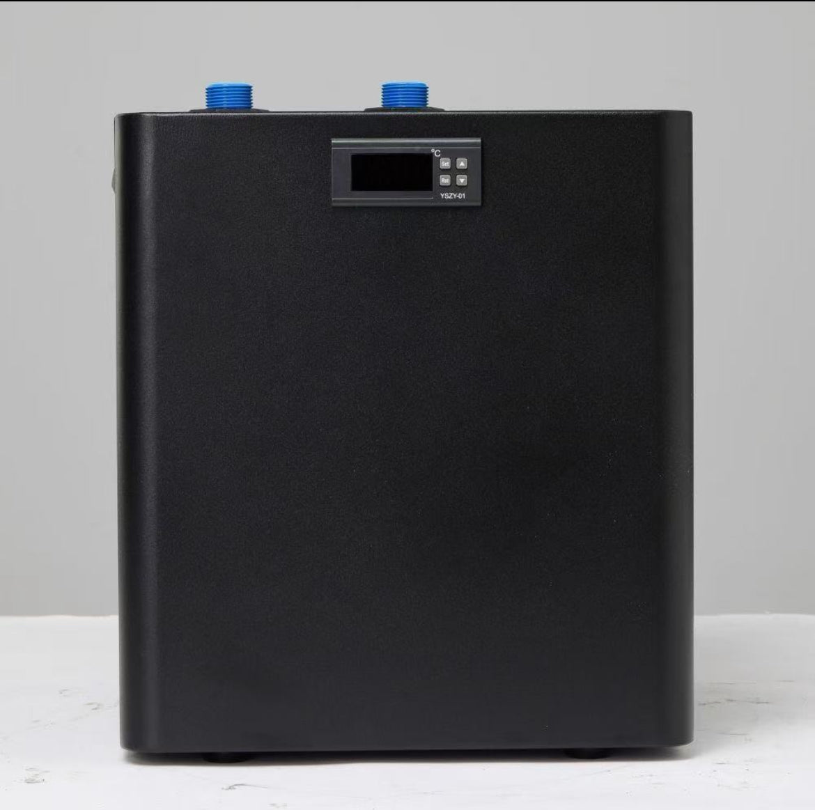Front view of the black home chiller unit with a digital display showing temperature controls