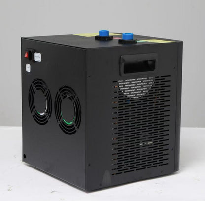 Angled view of the FatStick Boards home chiller unit showing side vents and a power switch