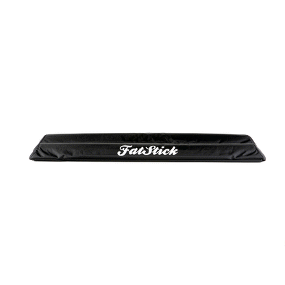 Top down elevated view of black FatStick Long Aero Roof Rack Bar Pads 71cm with white logo