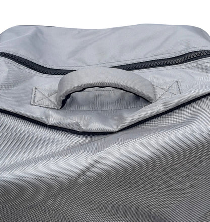 Close up of the sturdy top handle of the gray FatStick Wheeled Storage Bag Backpack.
