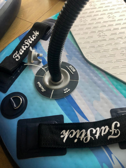 Close-up of the inflation valve and padded handles on the blue and white Inflatable 43 Fatstick Body Board.