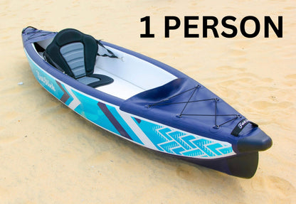 Inflatable 1-2 person drop stitch kayak package canoe ikayak on a sandy beach, set up for one person.